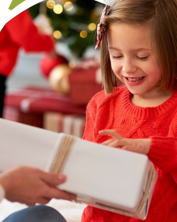 Girl unwrapping a present