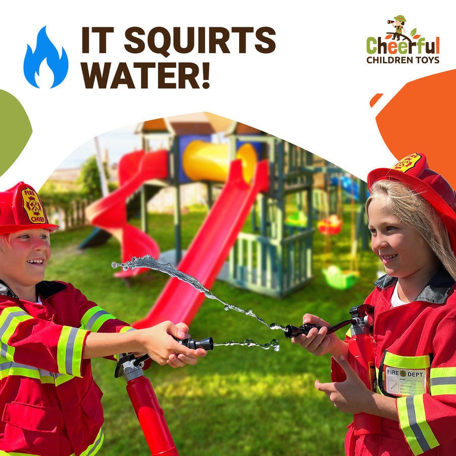 Boy in a firefighter jacket and helmet squirting water from the toy extinguisher