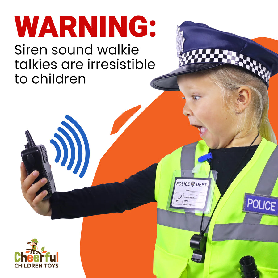 Girl in police cap and hi-vis vest shouting into a toy walkie-talkie