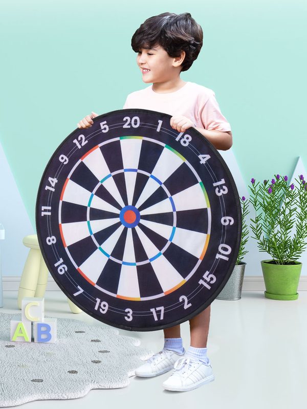 The same boy holding the 73cm board. It covers him from his knees to his shoulders.