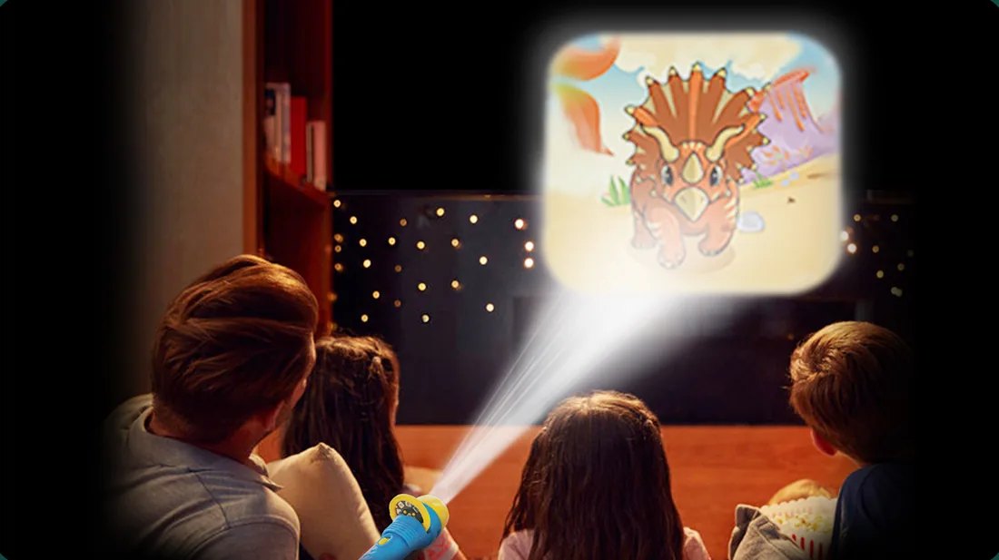 A family in a dark room watching a Triceratops the torch projects onto the wall